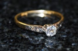 An 18ct gold claw set solitaire diamond ring. The diamonds approximately 25pts.