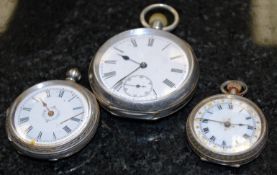 A silver Omega pocket watch along with 2 others, also silver.