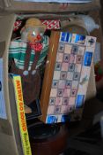 A box of assorted items to include clocks, puppets, jigsaw puzzle etc.