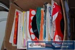 A box of vinyl record singles to include Scarlett Ribbons by Harry Belafonte etc