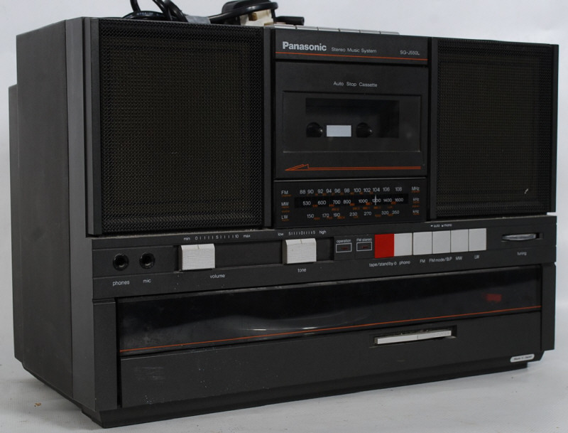 A portable Panasonic Hi-Fi system with built in retractable record player.
