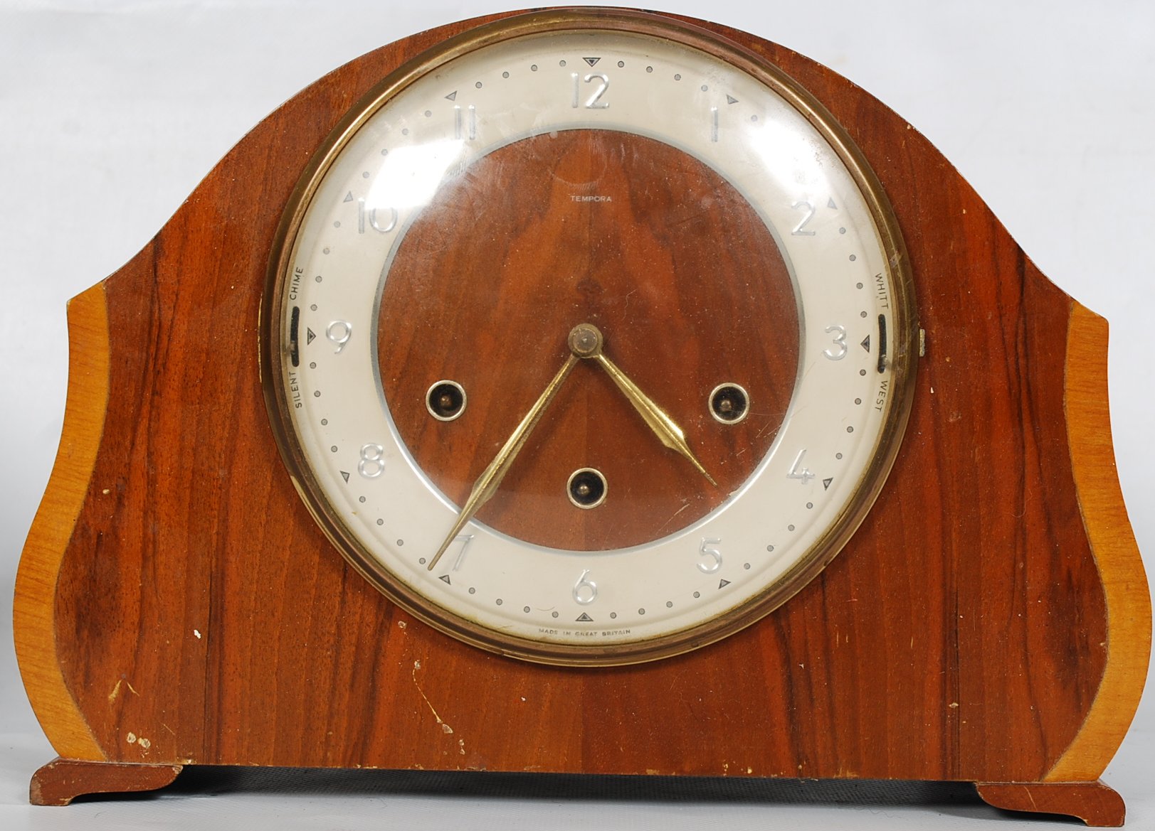 A 1930's Art Deco walnut mantle clock by Tempora with Westminster chiming movement by Smiths.