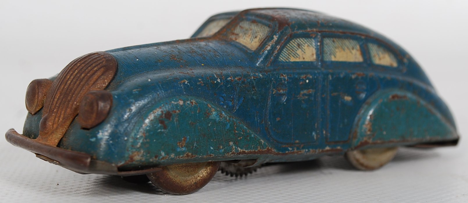 A pair of 1930's DRP ( D.R.P. ) German tinplate clockwork fastback toy cars