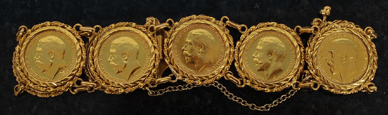 A 9ct gold gentlemans sovereign bracelet set with 8 sovereigns to the twin clasp bracelet complete