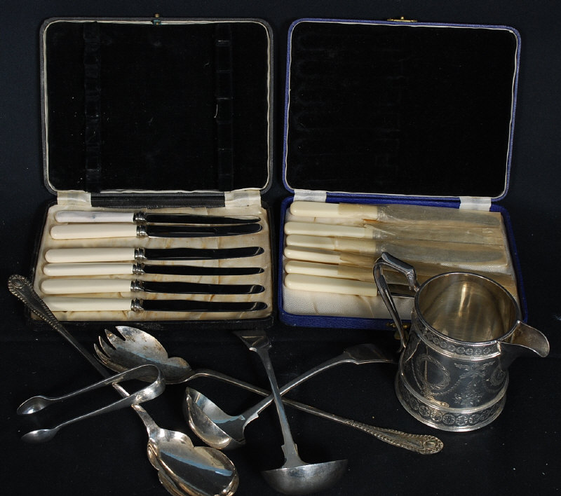 A collection of silver plate items to include RAF tongs - supposedly used by a pilot after taking