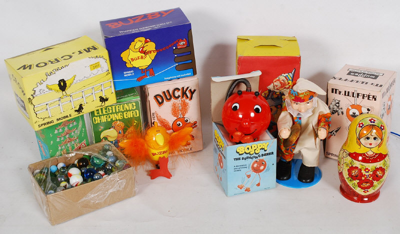 A collection of retro spring mobiles to include Buzby and Mr Crow along with other games and