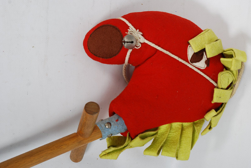 A vintage 1960's wooden hobby horse toy.