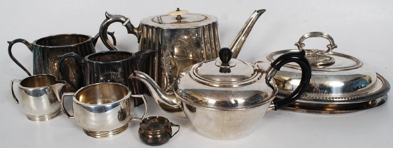 A silver plate teapot, tureen and others.