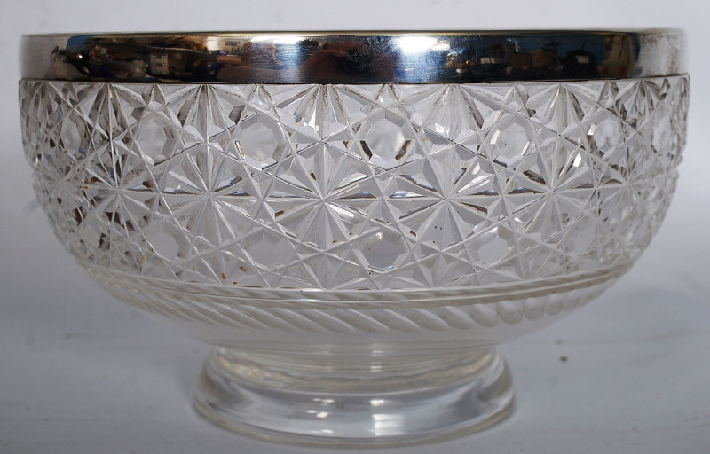 A silver hallmarked cut glass fruit bowl of good quality bearing a silver rim with makers initials
