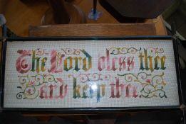 A Victorian needlepoint tapestry in an ebonised arts and crafts frame. 58cm x 24cm