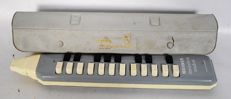 A Hohner Melodica - Students German musical instrument complete in the original carry case. 34cm