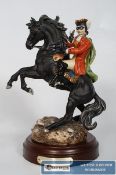 A Royal Doulton figurine of highwayman Dick Turpin, on a wooden plinth, with certificate. HN3272.