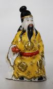 A 20th century decorative miniature good quality porcelain glazed  Chinese figurine of a seated