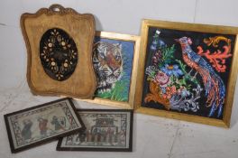 A collection of needlepoint / tapestry framed samplers to include medieval, wildlife and a