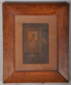 An antique copper book printers plate in a decorative birds-eye maple frame. Depicting a religious