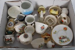 A collection of good old souvenir crested ware to include Ireland, cups etc.