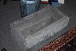 A 19th century stone trough of rectangular form (af)