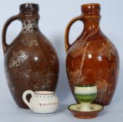 2 pieces of Motto ware together with a pair of mid 20th century pottery jugs.
