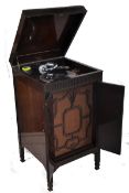 An original working order 1940`s mahogany cased gramaphone having hinged top, good record deck with