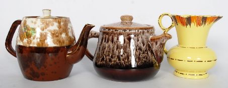 2 ceramic teapots, 1 Kensington Price, the other Honnington along with a Lingard yellow jug.