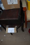 An Edwardian mahogany piano stool along with a small table