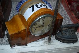 A vintage burr walnut mantel clock, along with an iron, trivet and nursing table