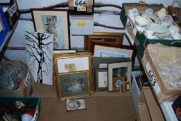 A quantity of pictures and prints along with a gilt mirror.