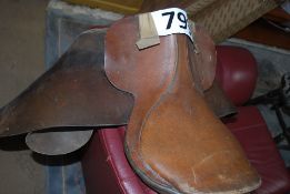 A real leather horse saddle.
