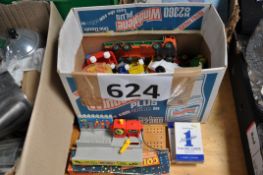 A box of diecast and vintage toys to include Dinky, Corgi etc.