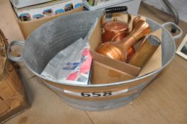 A vintage tin bath, brasswares and trench shell etc.