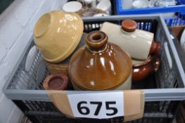 A quantity of stoneware to include cider jars, foot warmer etc.
