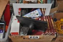 A crate of mixed items to include a body massager, a speaker wall stand etc etc.