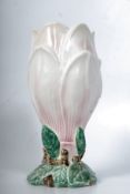 A good 1930`s Clarice Cliff style flower vase. The decorative stem base having petal sides