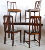 An oak writing table together with 3 1930`s dining chairs and an Edwardian dining chair