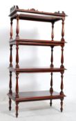 A good quality walnut Victorian style 4 tier whatnot etarge. Turned legs with gallery sides to each