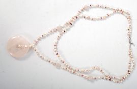 A multicoloured pearl and rose quartz necklace.