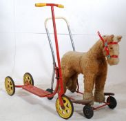 A 1950`s Lines Brothers of Ireland ride-on / push-along childs toy having a plush bodied lion