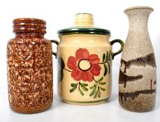 A West German 1970`s Rumptoff lidded pot together with 2 Fat Lava vases, all with markings to the