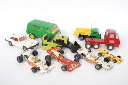 Four vintage Tonka toys, along with a The Saint Jaguar XJS, Corgi F1 cars etc