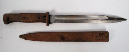 An early 20th century German Army military bayonet by Erfurt being marked to the blade. Wooden