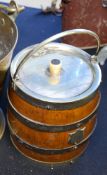 A good quality 1930`s oak coopered barrel ice bucket having silver plate bindings with hoop handle