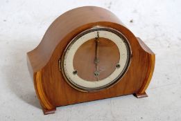 A 20th century Andrews 4 jewel movement mantle clock with key.