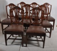 8 Leather & Mahogany dining chairs dating to the mid 20th century in the Hepplewhite style. Squared
