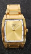 A gold plated wrist watch with dial stamped `Softech` having minimalist face with chain set strap