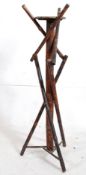A Chinese Victorian bamboo aesthetic movement plant stand / torchere / jardiniere. The thick bamboo
