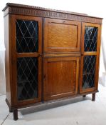 A 1930`s leaded glass oak bureau bookcase / display cabinet. The turned legs supporting leaded