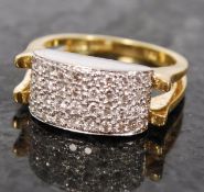 An 18ct yellow gold pave set ladies diamond ring. The large pave set centre having on floating