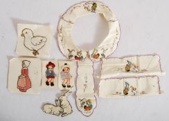A small quantity of vintage embroidery patches on silk, together with embroidered characters and