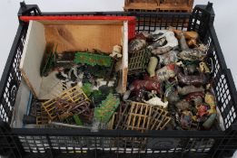A good selection of lead farm and animal farm toys along with wooden buildings.