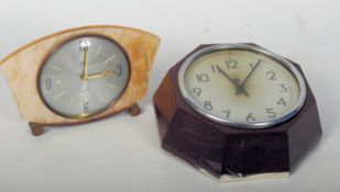A Bakelite smiths electric station clock of hexagonal form together with a good 1950`s smoked resin